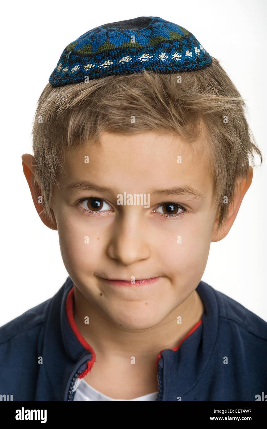 studio portrait of white boy with Jews kipa or yarmulke Stock Photo - Alamy