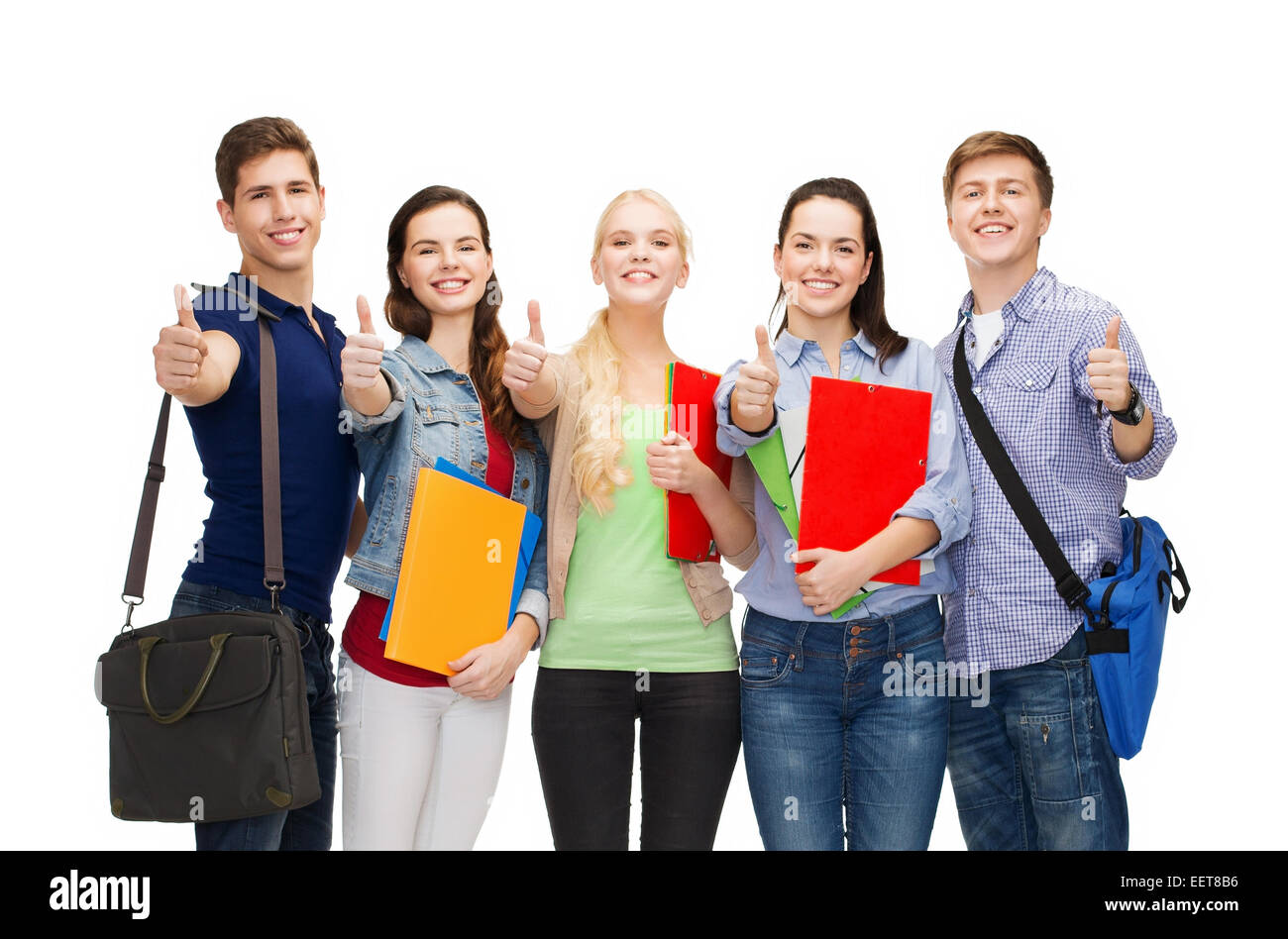 group of smiling students showing thumbs up Stock Photo - Alamy