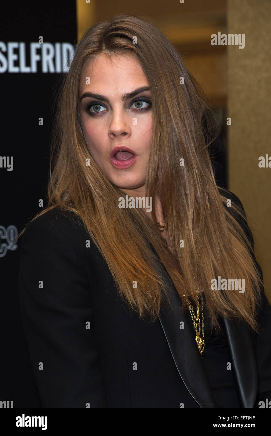 UK model Cara Delevingne appears at the Selfridges Store in Oxford St. London as part of YSL campaign. Stock Photo