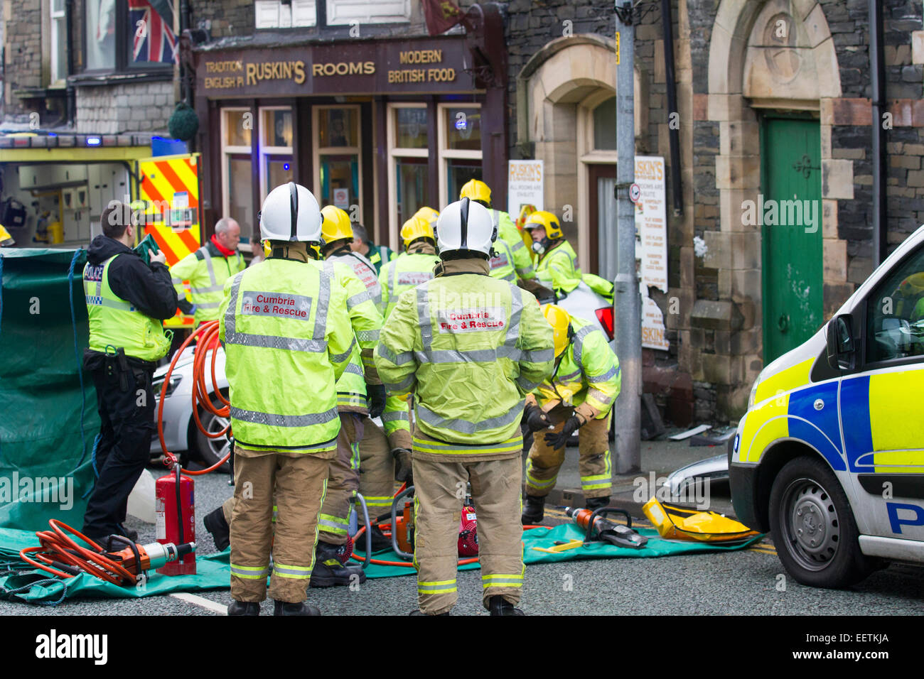 Bowness on Windermere Cumbria UK 21st January 2015. Car crashed into shop .Elderly woman has to
