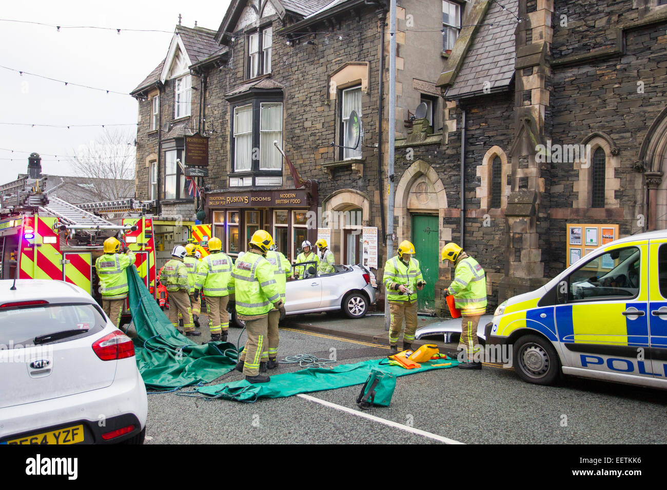 Bowness on Windermere Cumbria UK 21st January 2015. Car crashed into shop .Elderly woman has to