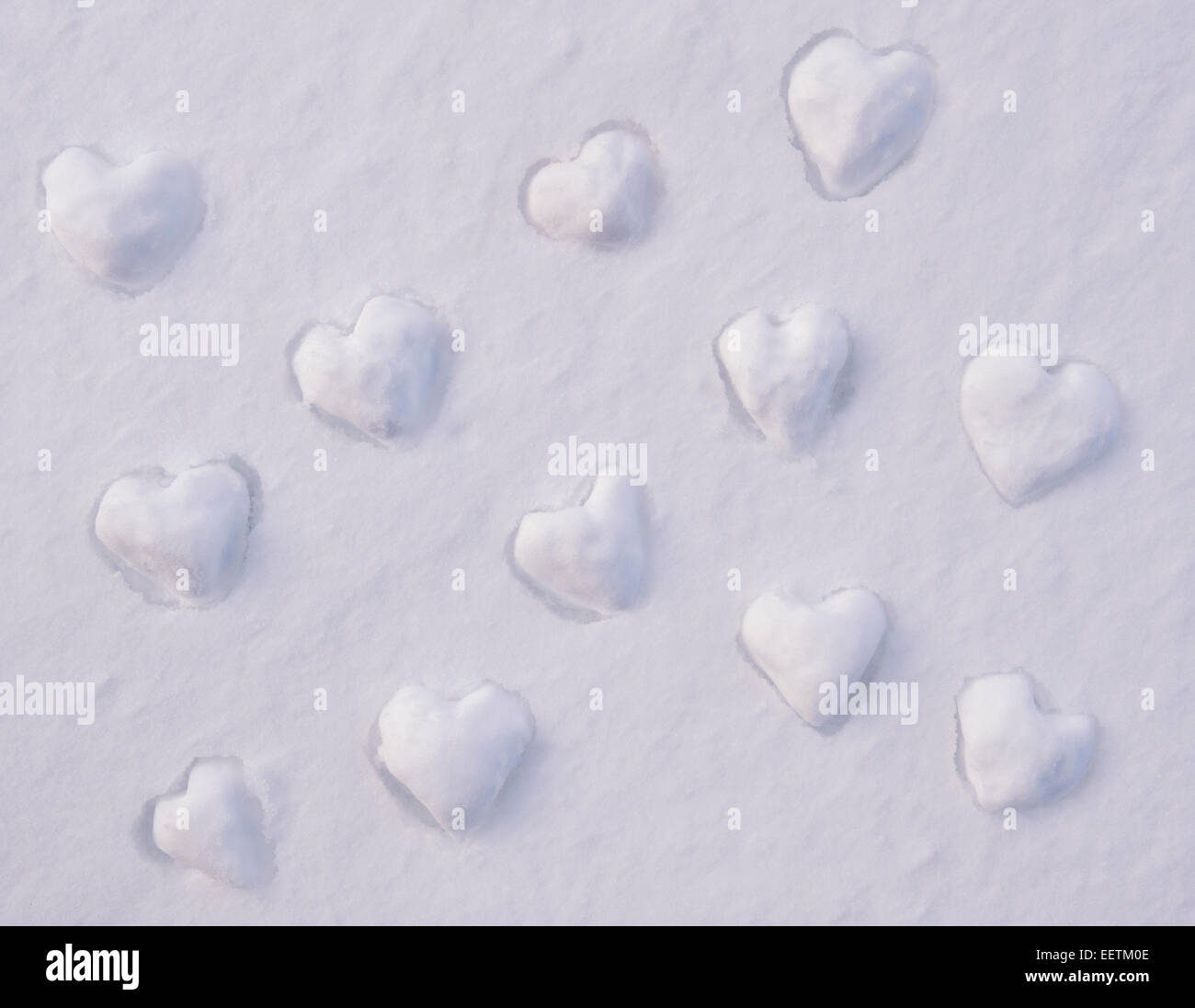 Love heart shapes in the snow Stock Photo