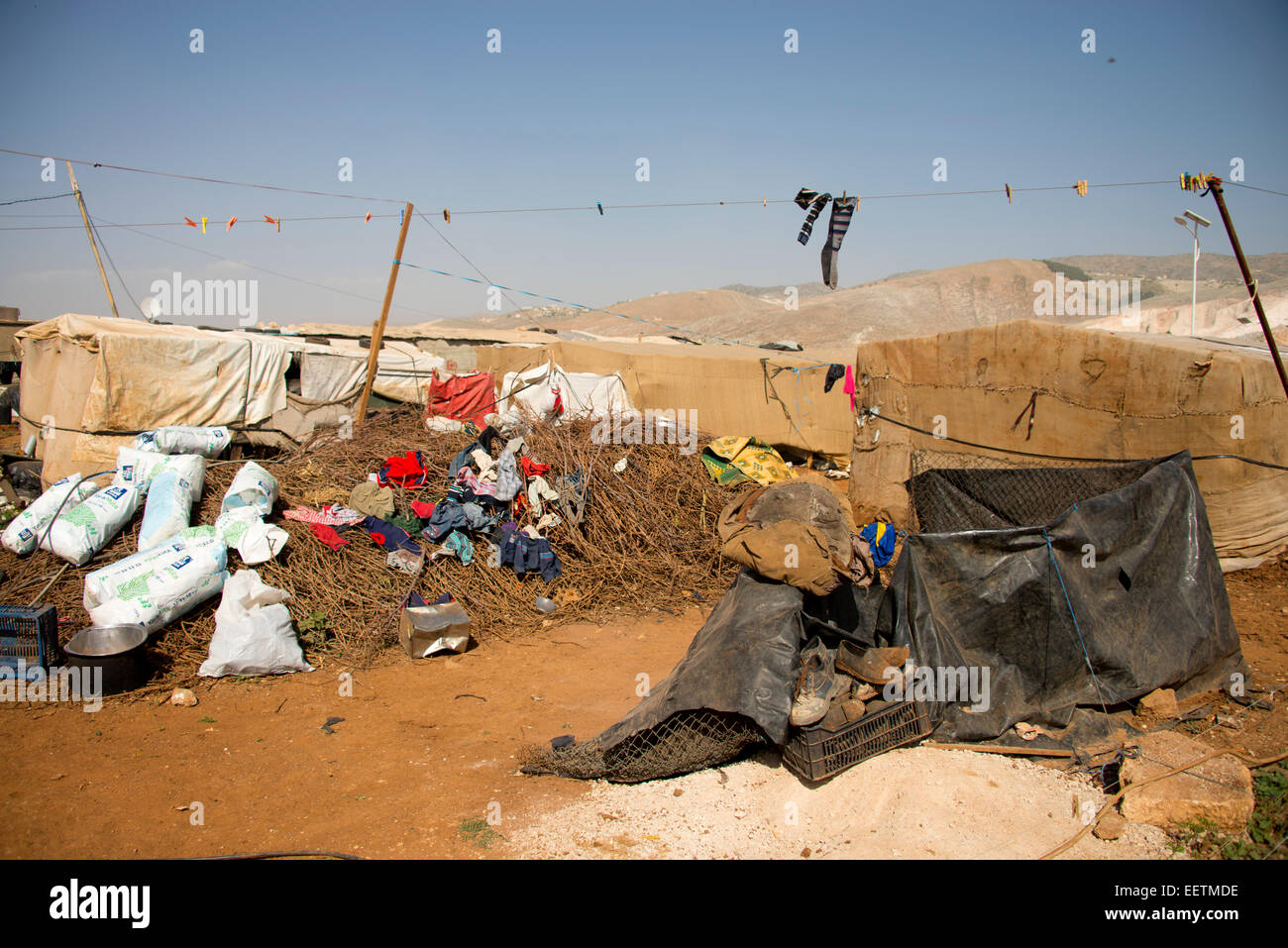 Refugee camp rubbish and washing, Lebanon Stock Photo
