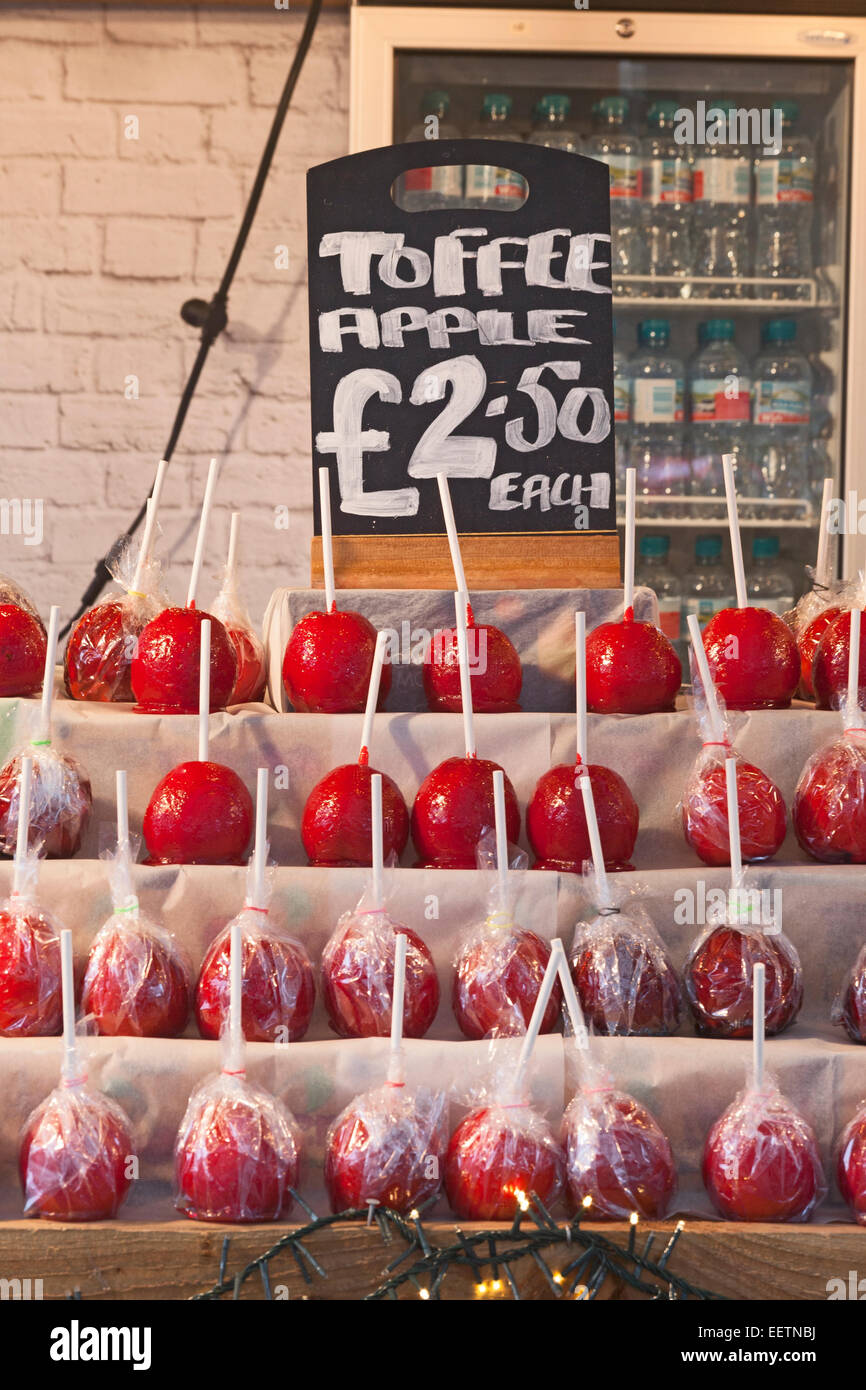 Toffee apples for sale on a stall in London's Oxford Street Stock Photo