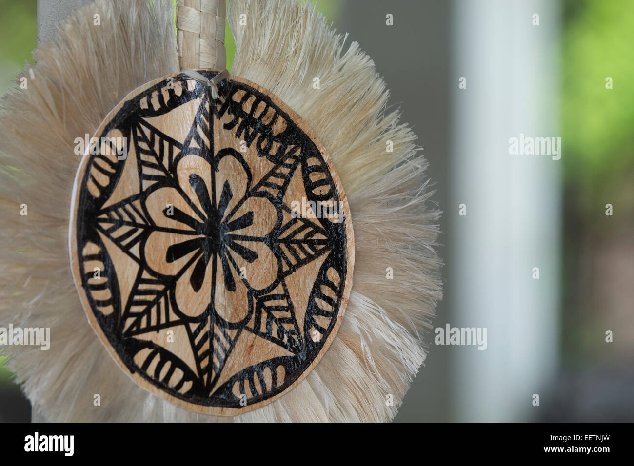 Kingdom of Tonga, Vava'u Islands, Neiafu. Hand painted tapa cloth souvenir handicraft fan. Stock Photo