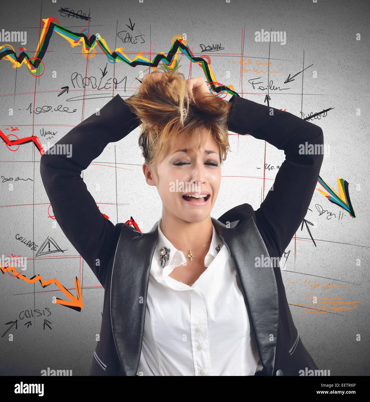 Exhausted businesswoman despairs for the financial collapse Stock Photo