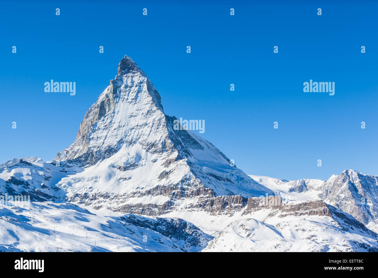 View of Matterhorn on a clear sunny day on the winter hiking path, Zermatt, Switzerland Stock Photo