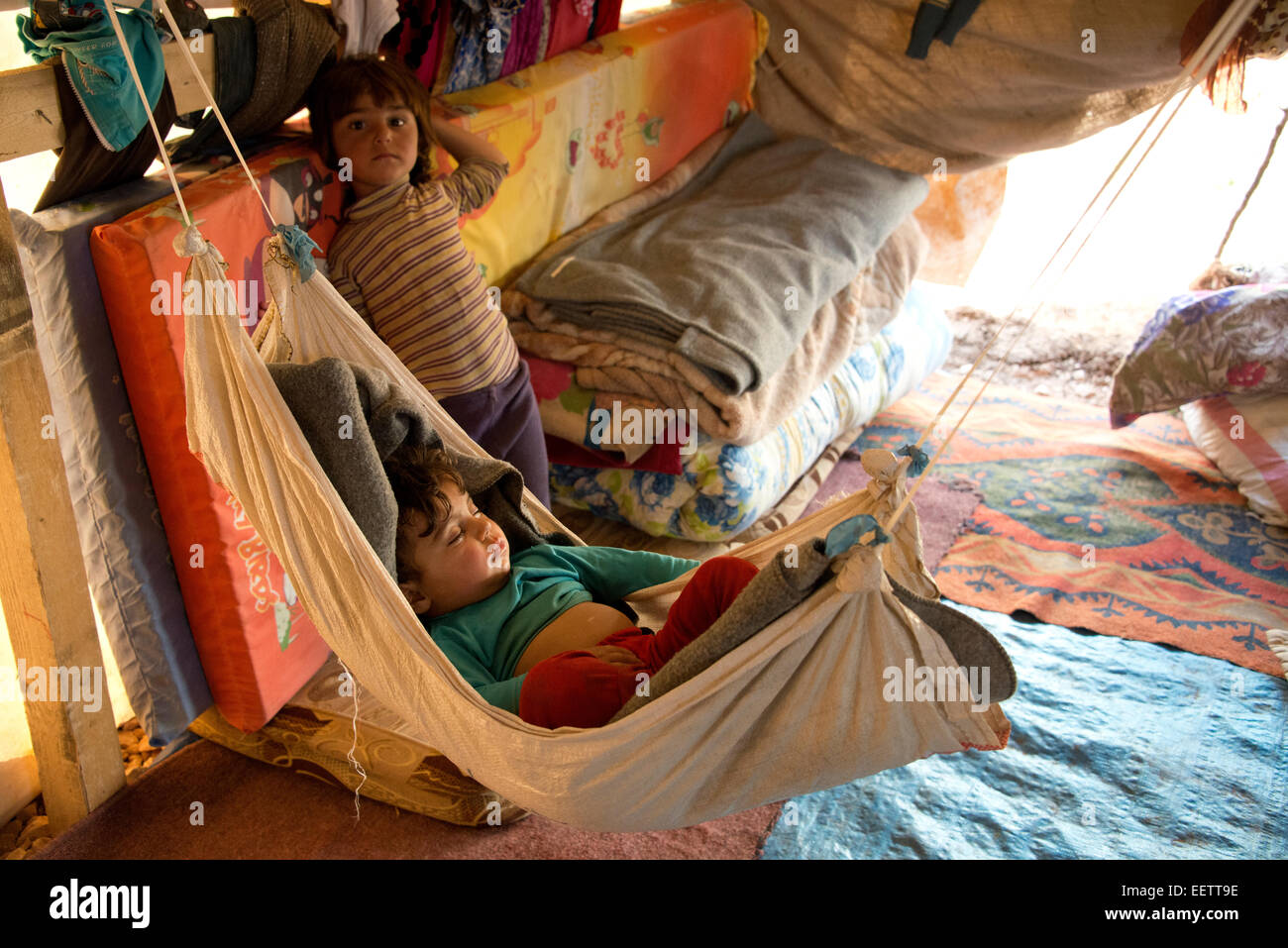 Baby sleeping in hammock, Syrian refugee camp, Lebanon Stock Photo Alamy