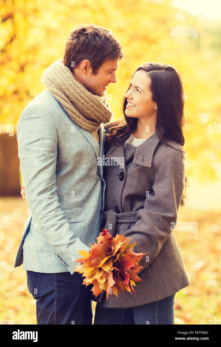romantic couple kissing in the autumn park Stock Photo - Alamy