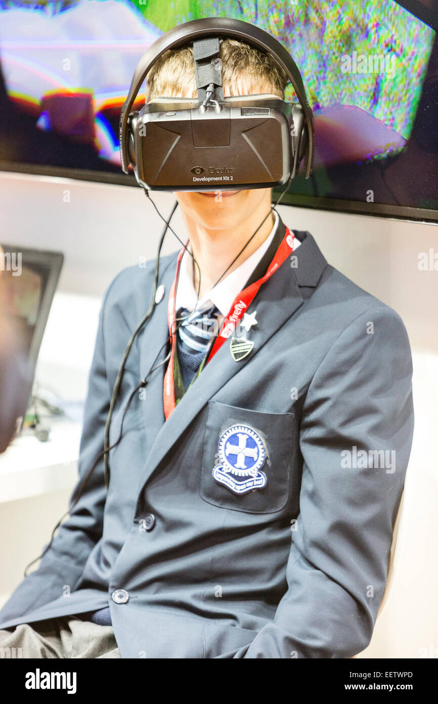 London, UK. 21st January, 2015. BETT 2015 in London.  A student from Passmores Academy, featured in Channel 4's 'Educating Essex', tries out the Oculus Rift virtual reality headset. Credit:  Dave Stevenson/Alamy Live News Stock Photo