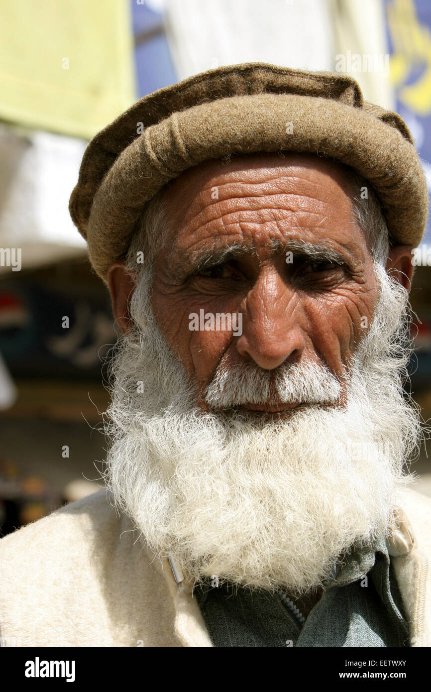 Old man wearing traditional style beret called a pakol, in Northern area of Pakistan, SWAT valley. Stock Photo