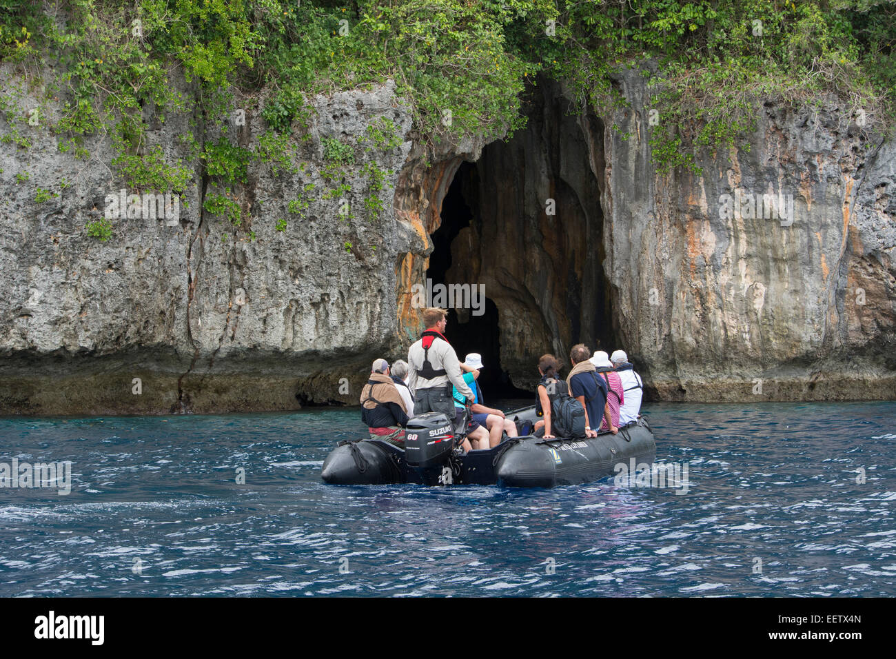 Kingdom of Tonga, Vava'u Islands, Swallow's Cave near Neiafu. Tourists in zodiac exploring cave. Stock Photo