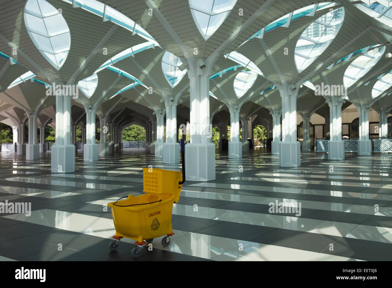 Early Morning Cleaning Equipment At A Malaysian Mosque Stock Photo