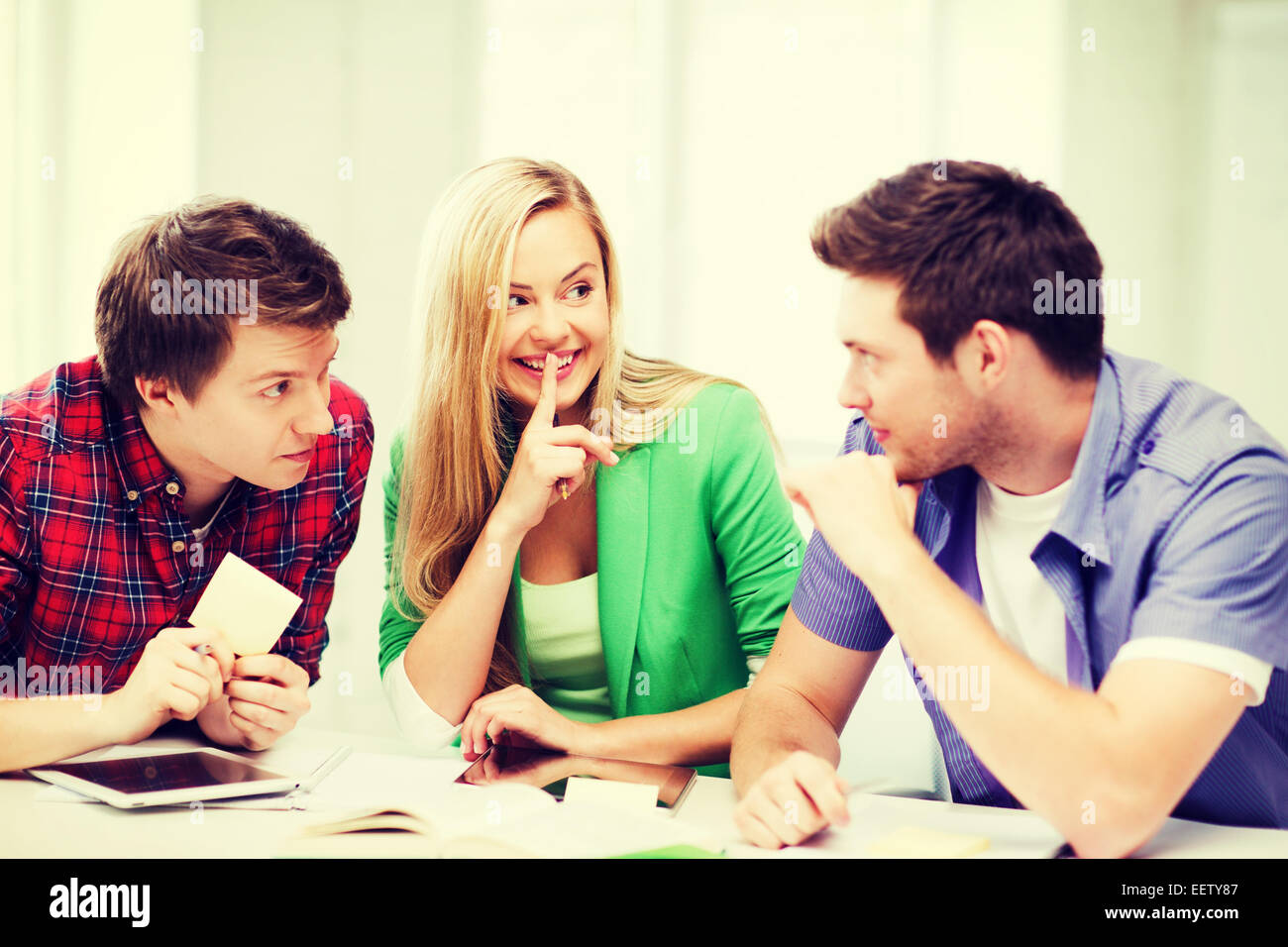 group of students gossiping at school Stock Photo - Alamy