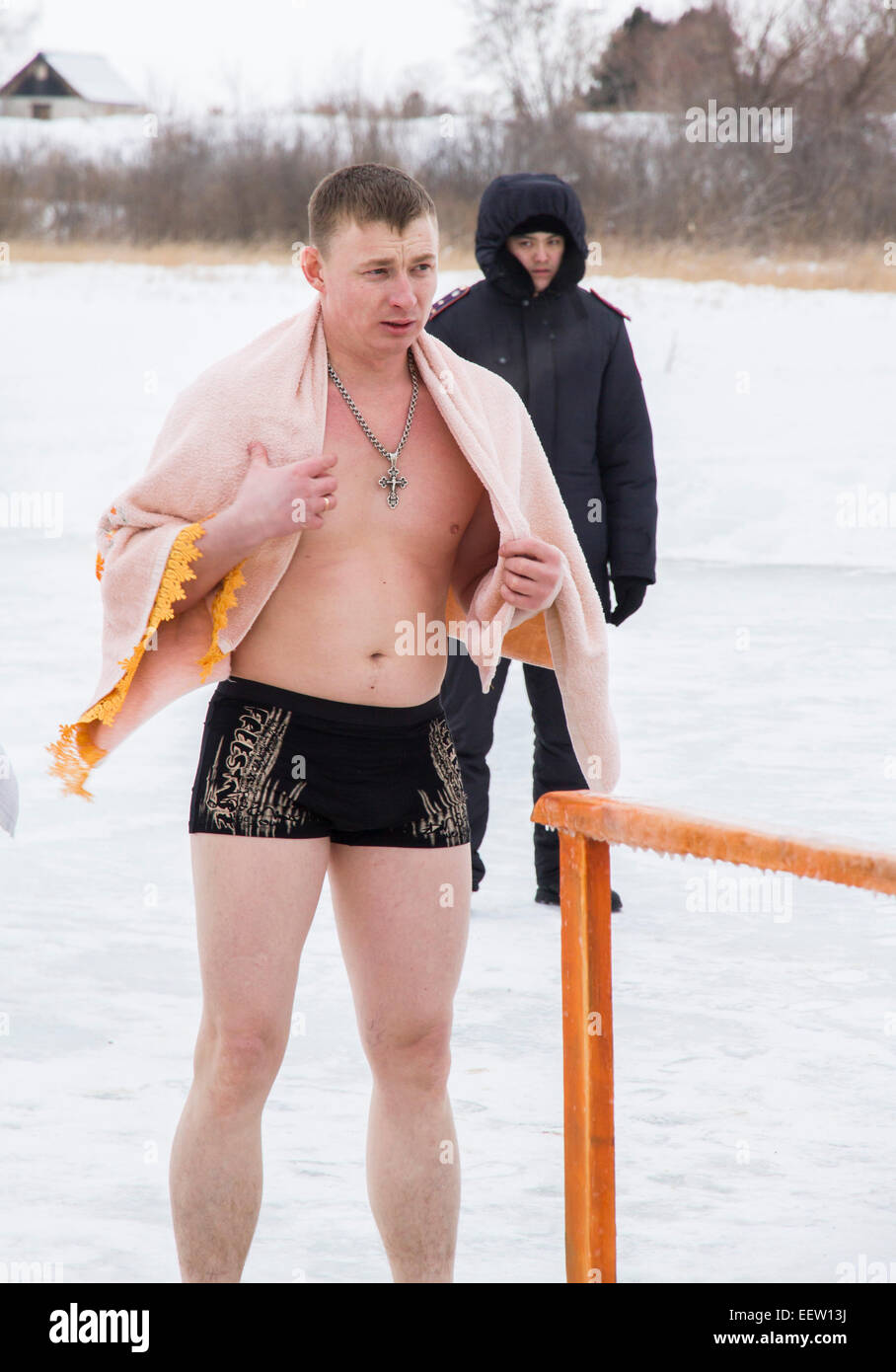 PETROPAVLOVSK, KAZAKHSTAN- JANUARY 19, 2015: man before bathing. Orthodox church Holy Epiphany Day Stock Photo