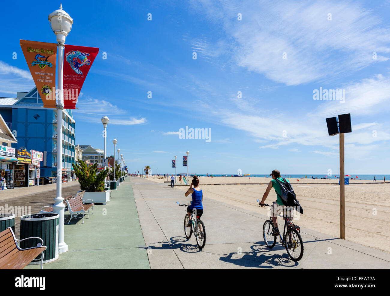 Cyclists on the boardwalk at Ocean City, Maryland, USA Stock Photo
