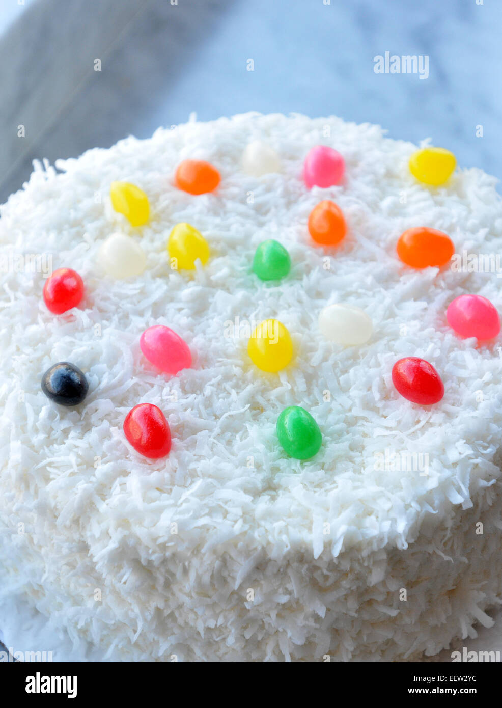 Easter cake with coconut frosting and jelly beans Stock Photo Alamy