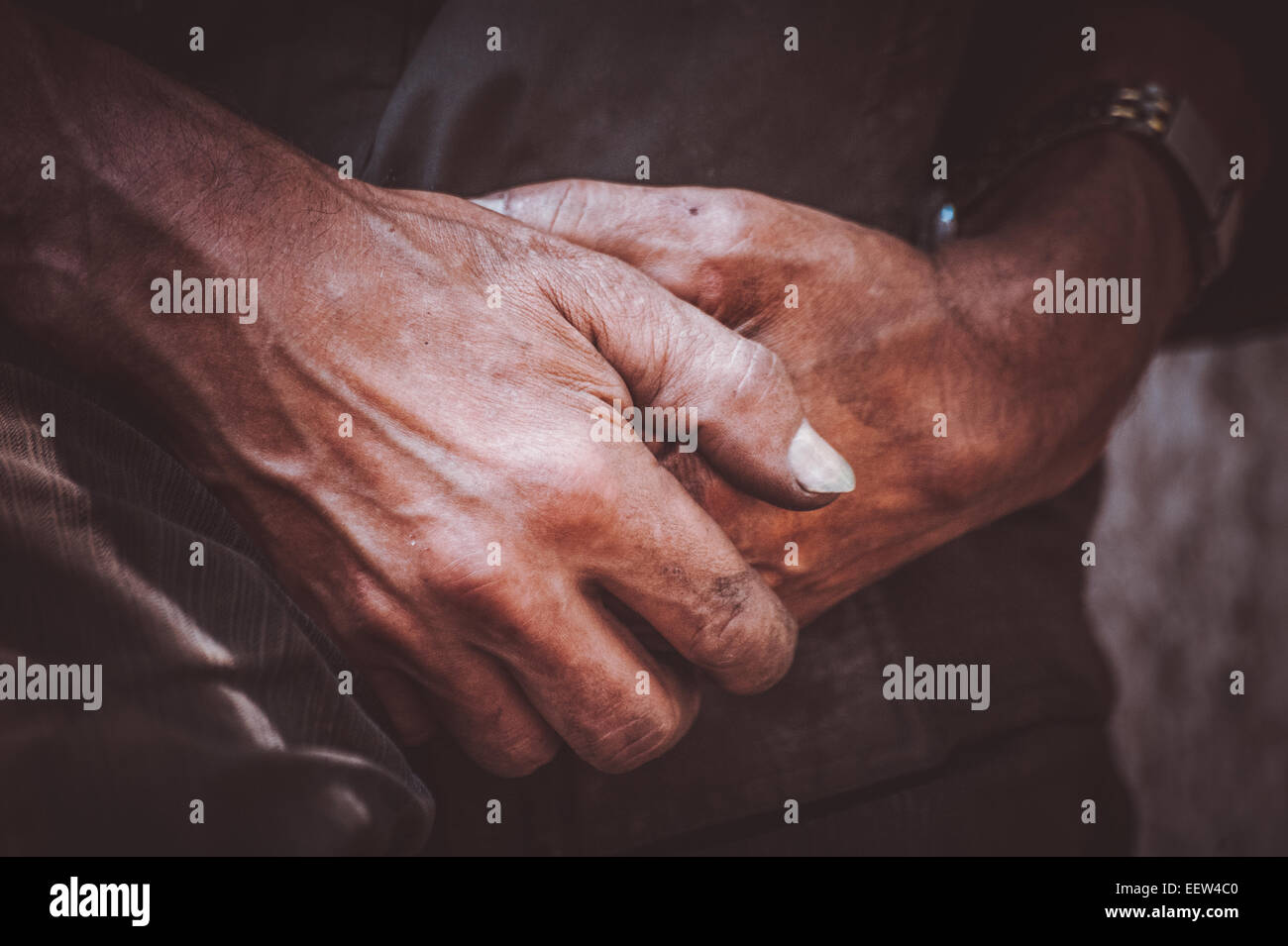 dirty hand of miner worker no face Stock Photo