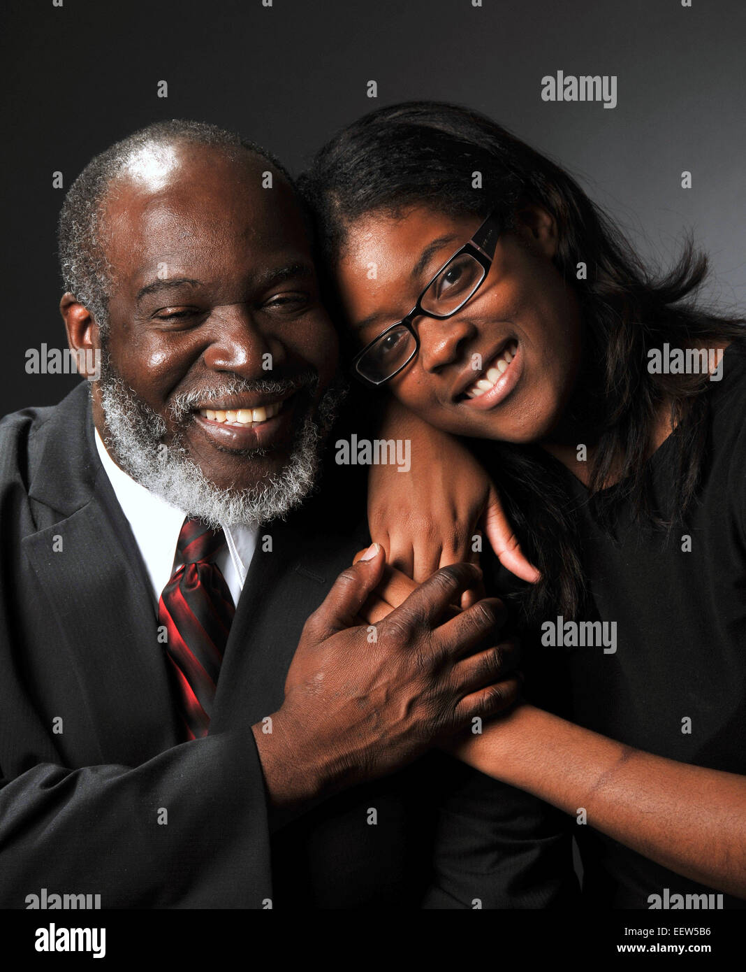 Father's Day portraits. Reverend Jose Jean Champagne, with his daughter Melissa Vera, age-22. (New Haven CT USA) Stock Photo