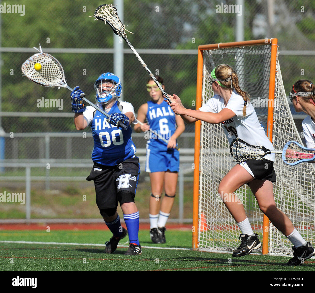 High school girl's Lacrosse action in CT USA Stock Photo