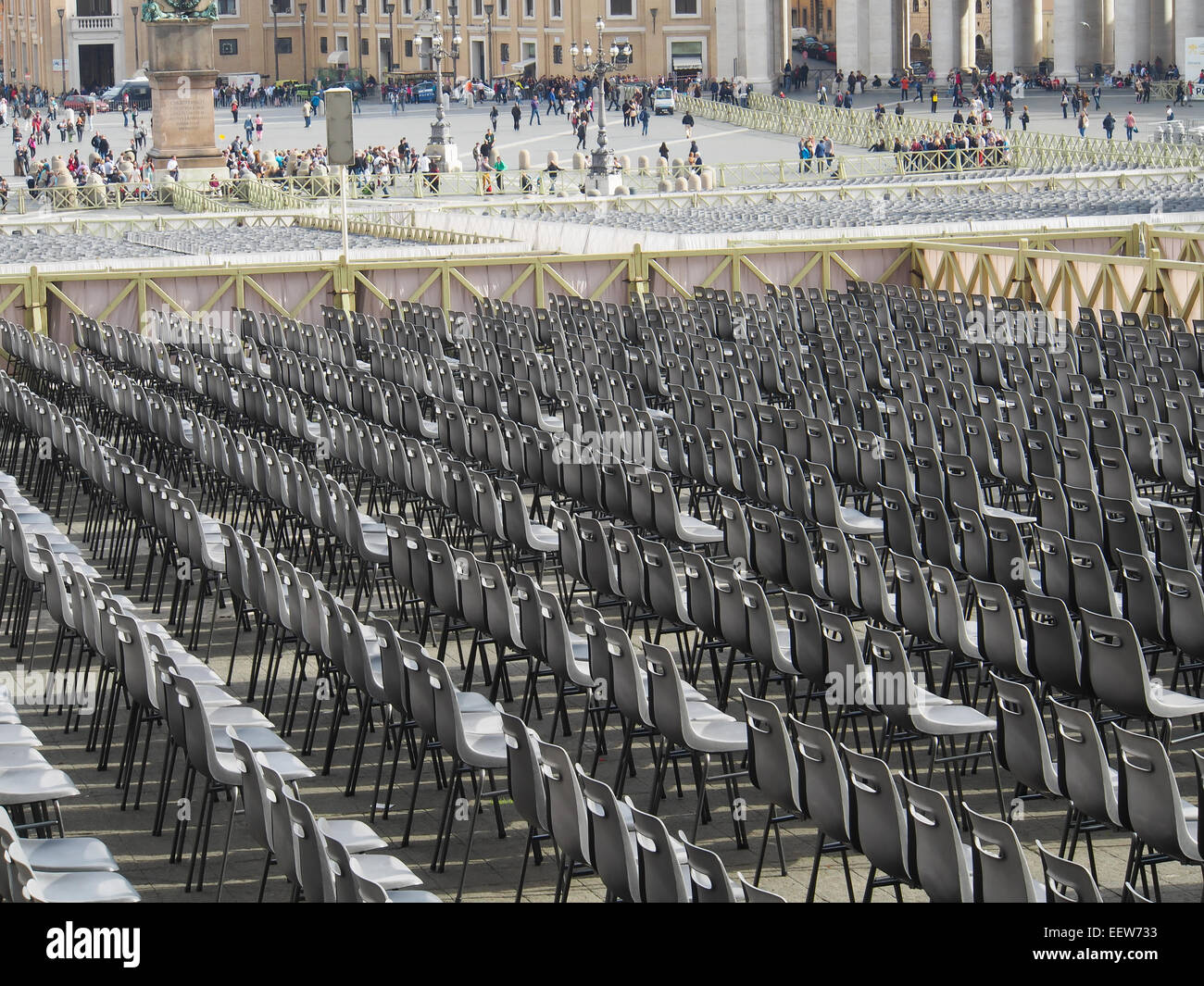 Multiple rows of black seats. Vatican Stock Photo
