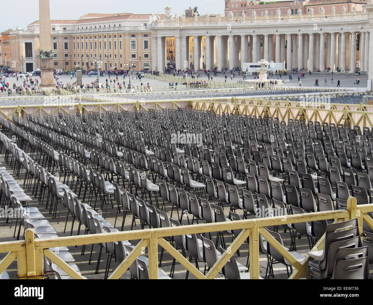 Multiple rows of black seats. Vatican Stock Photo