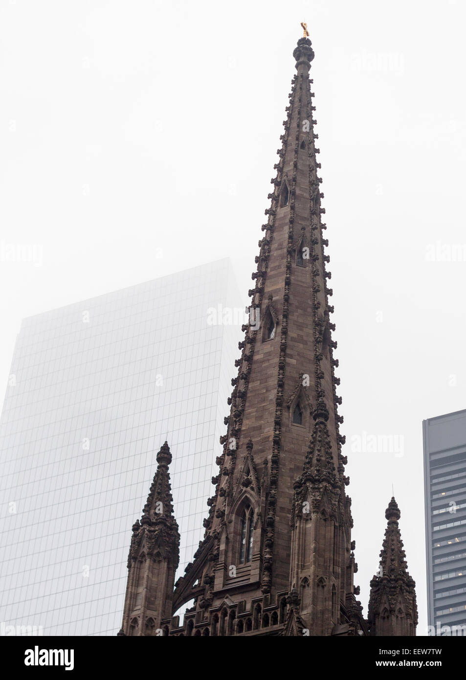 The Spire of Trinity Church in Lower Manhattan a study in contrasts