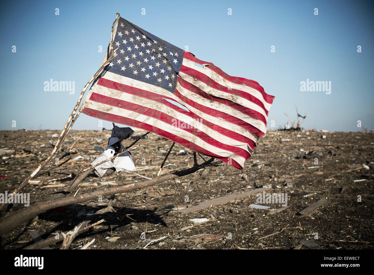 American flag in debris after tornado Stock Photo