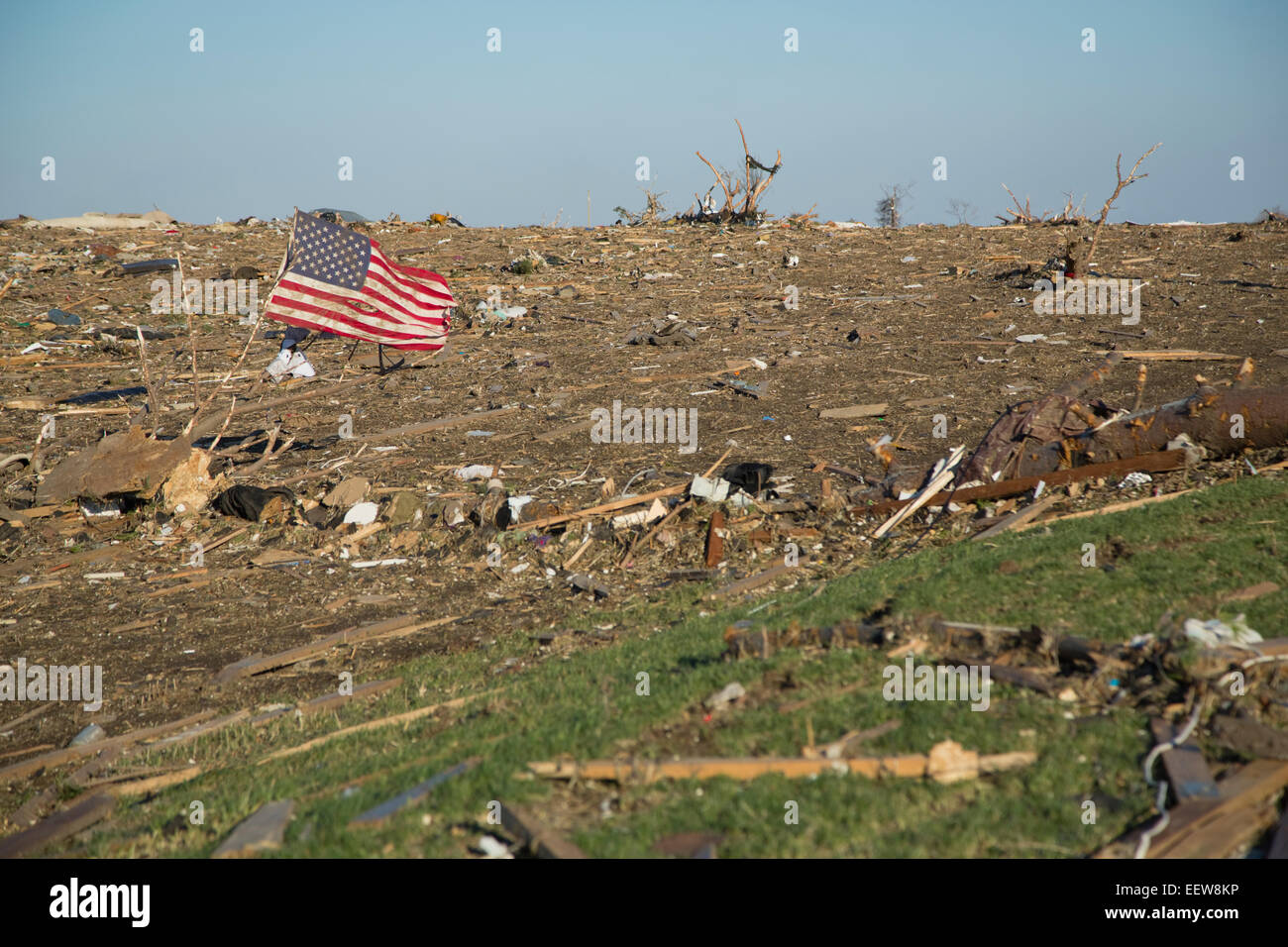 American flag in debris after tornado Stock Photo
