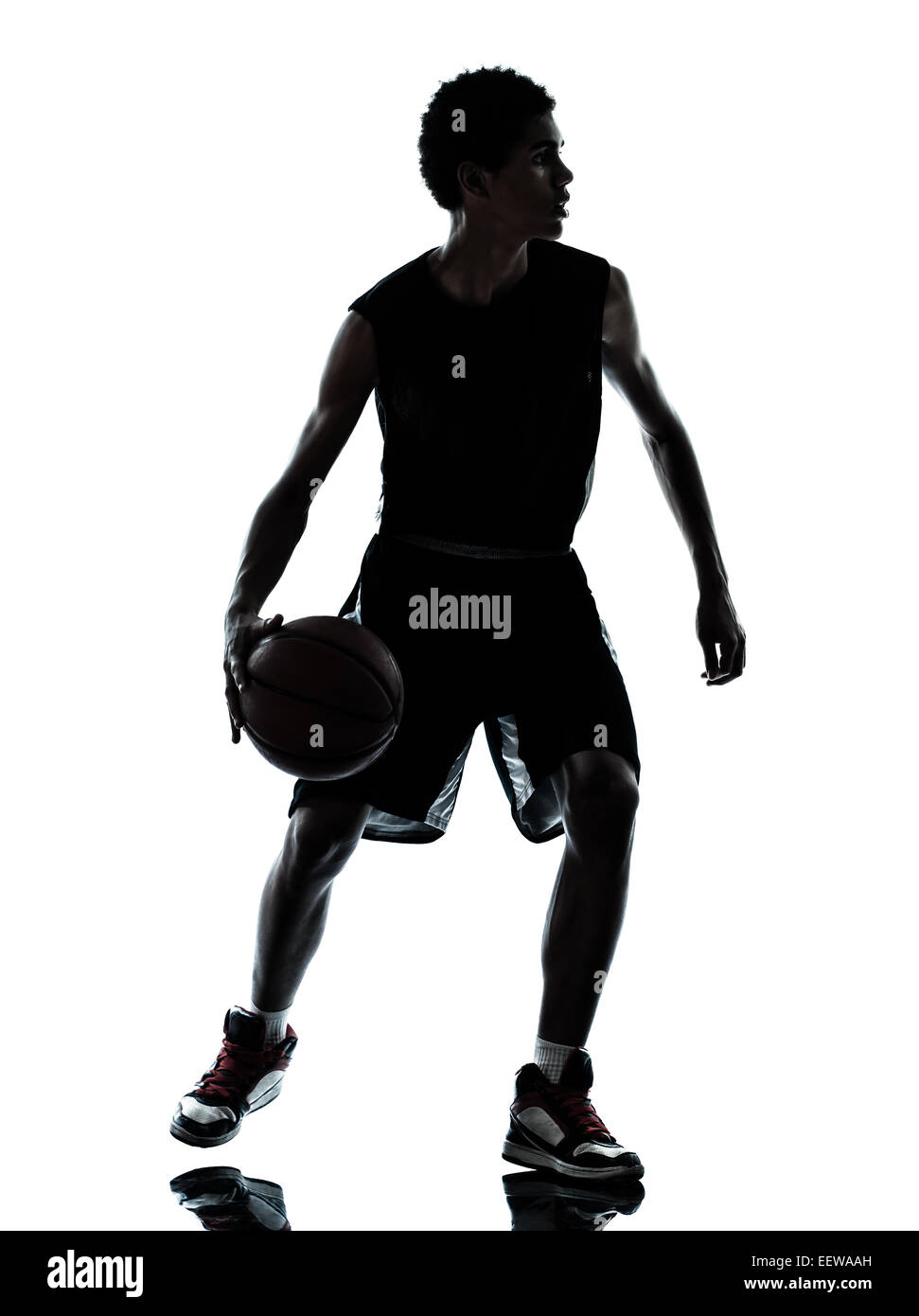 one young man basketball player silhouette in studio isolated on white ...