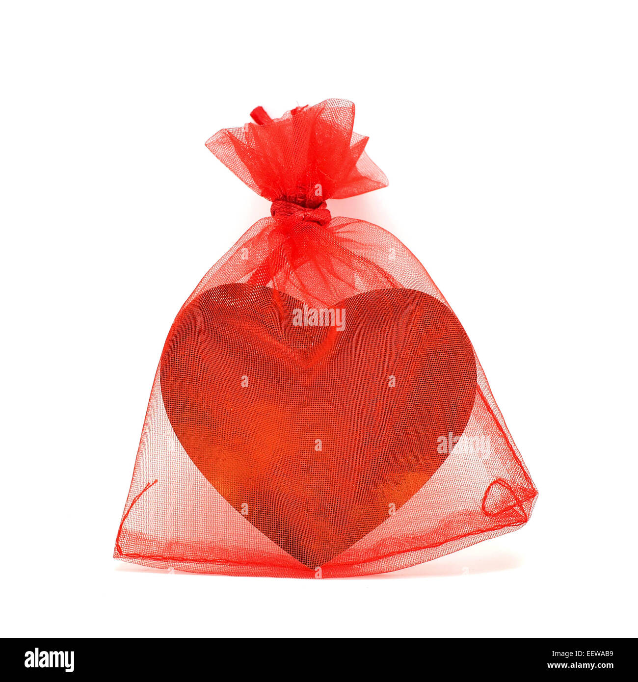 golden heart in red pouch for valentine gift Stock Photo
