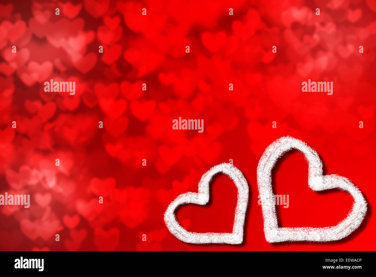 two white hearts against the red blurred background Stock Photo - Alamy
