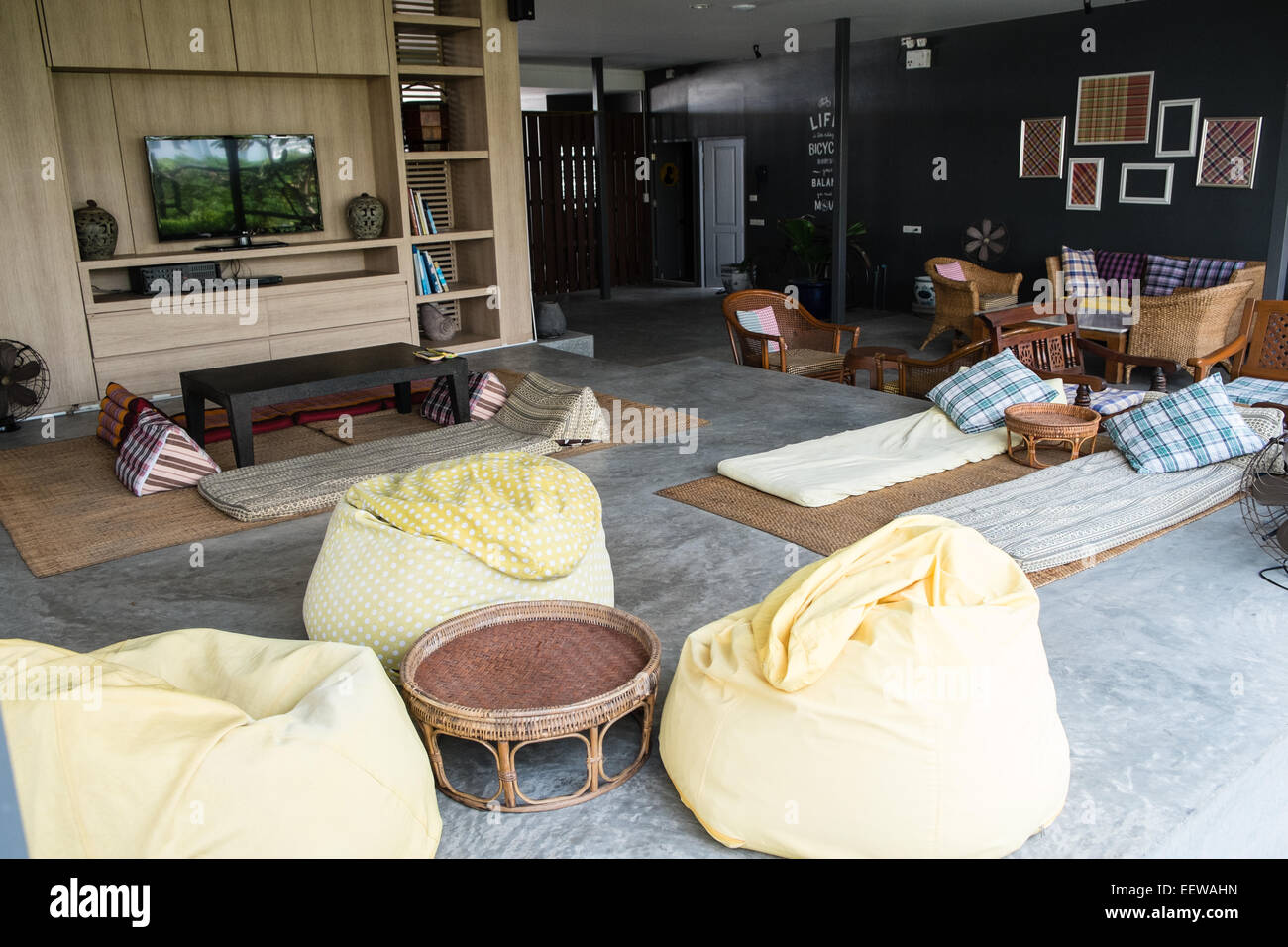 Trendy bean bag seats and relaxing zone on roof top floor of backpacker