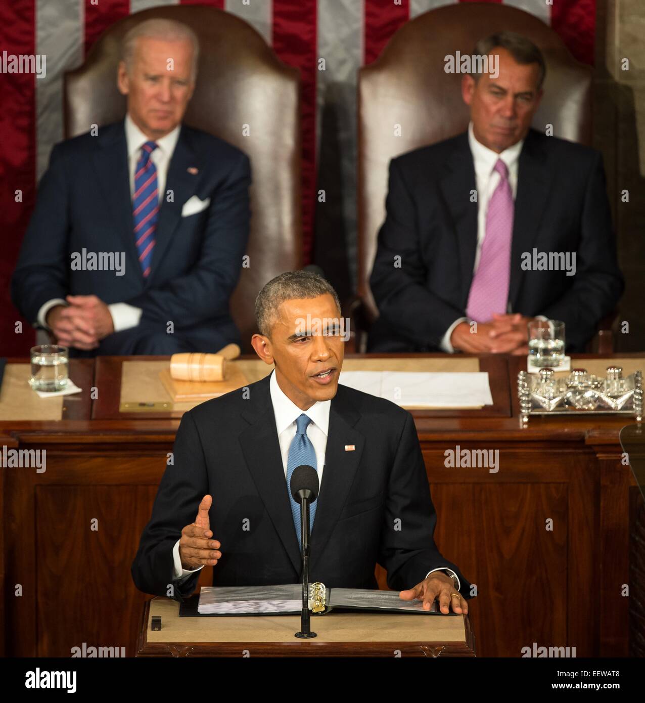 US President Barack Obama delivers his State of the Union address to a joint session of Congress on Capitol Hill as Vice President Joe Biden and House Speaker John Boehner of Ohio Look on January 20, 2015 in Washington, DC. Stock Photo