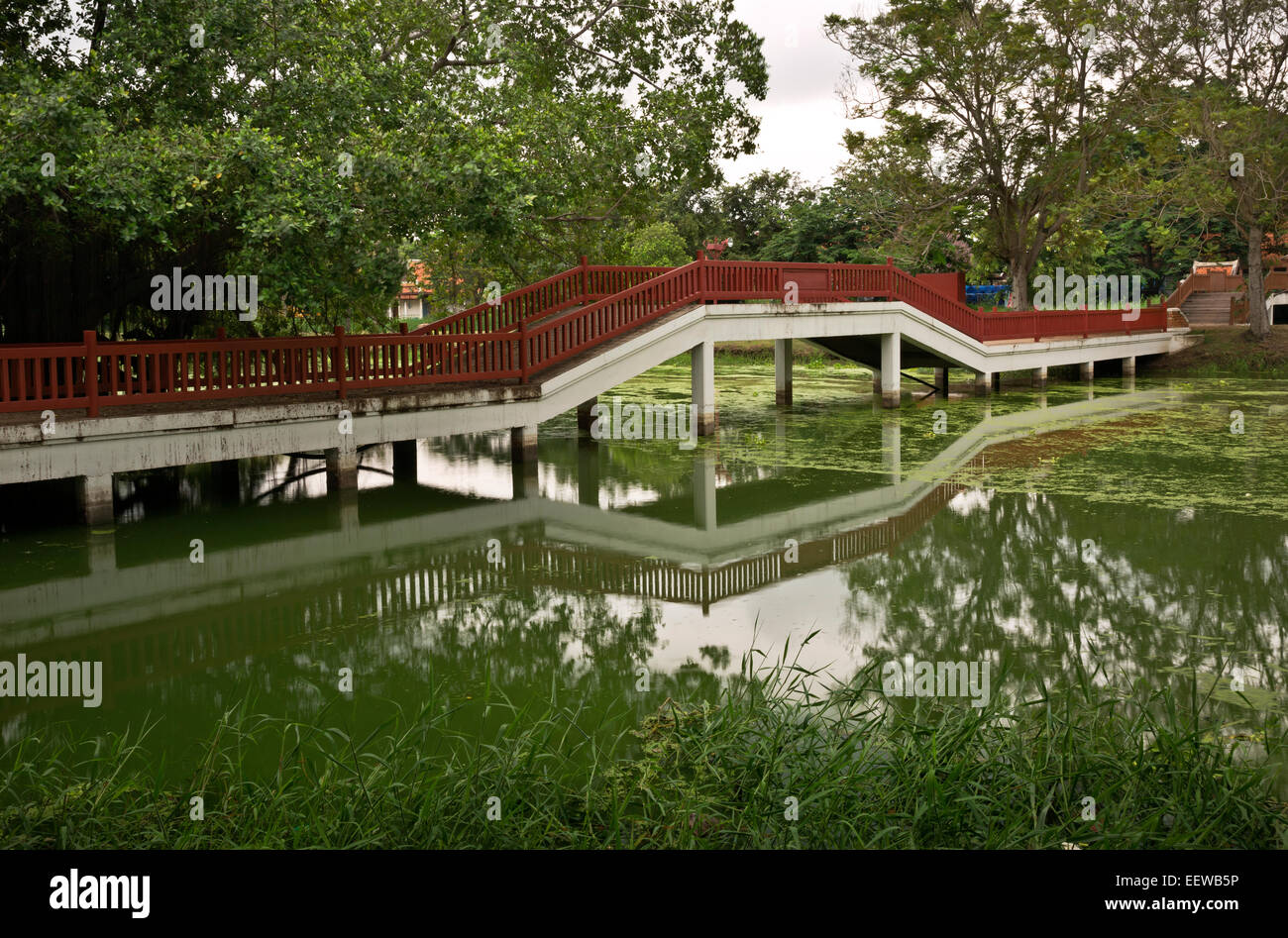 TH00324-00...THAILAND - Bridge over a canal in the Phra Ram Park located at the center of the Ayutthaya Historical Park. Stock Photo