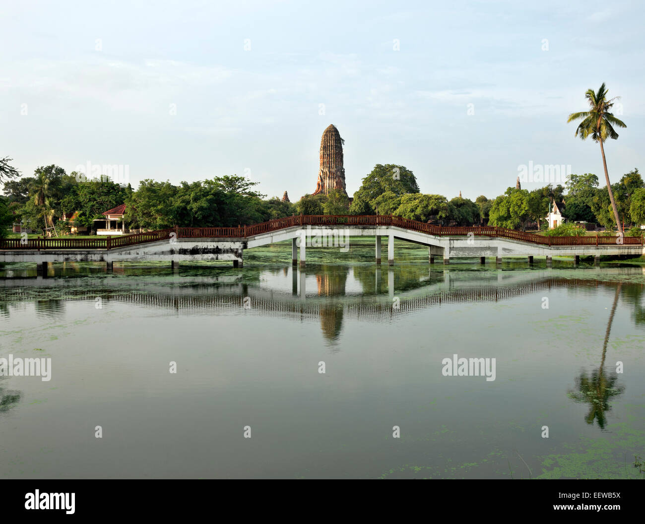 TH00326-00...THAILAND - Bridge over a canal in the Phra Ram Park located at the center of the Ayutthaya Historical Park and the Stock Photo