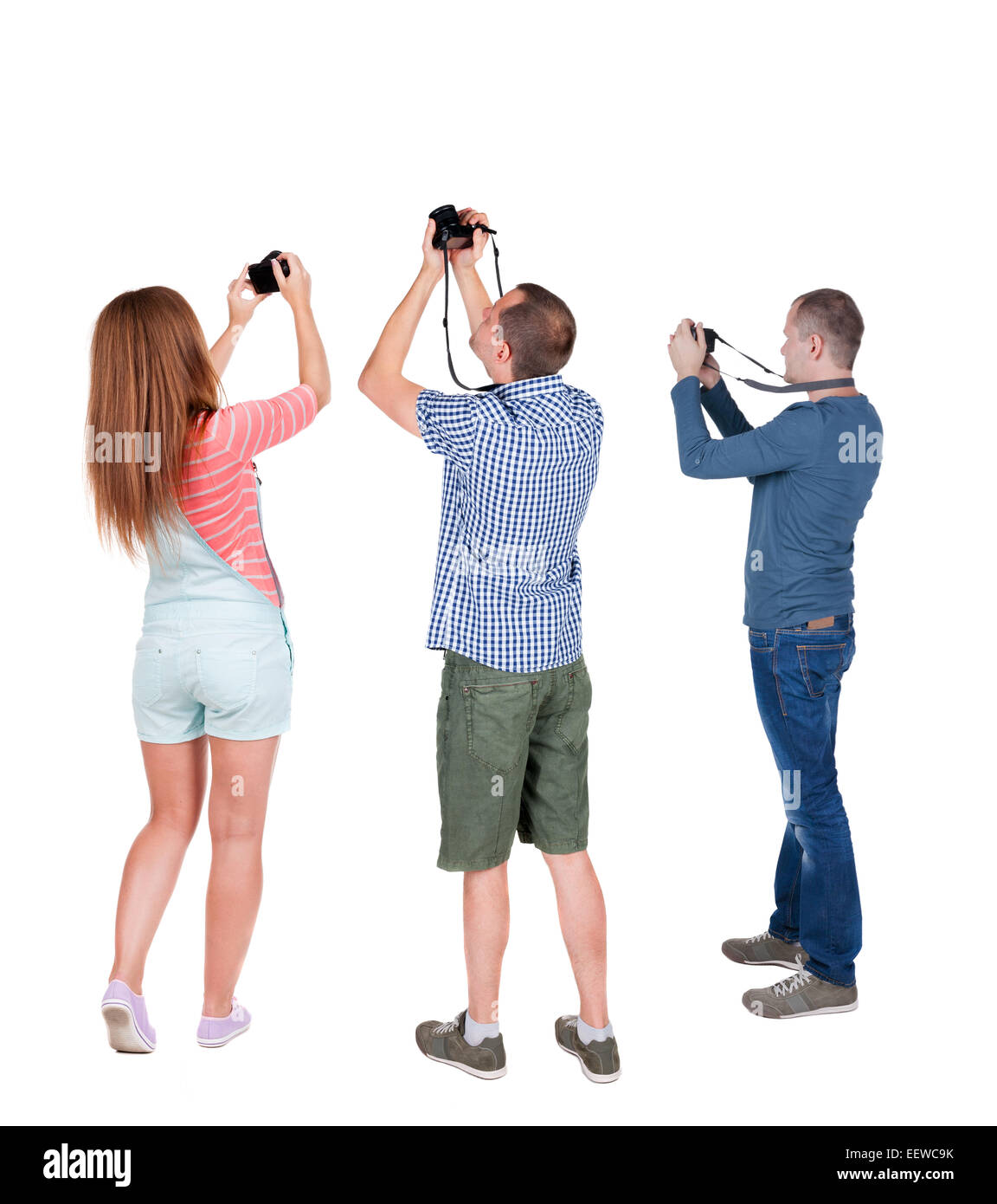 Back view group of people photographed attractions. Rear view team