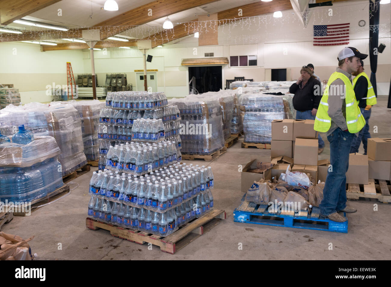 Glendive, Montana, USA. 21st January, 2015. A stock of bottled water awaits pickup by Glendive residents. Each resident is allotted two gallons of bottled water per day currently, a staffer said. Credit:  Thomas Lee/Alamy Live News Stock Photo