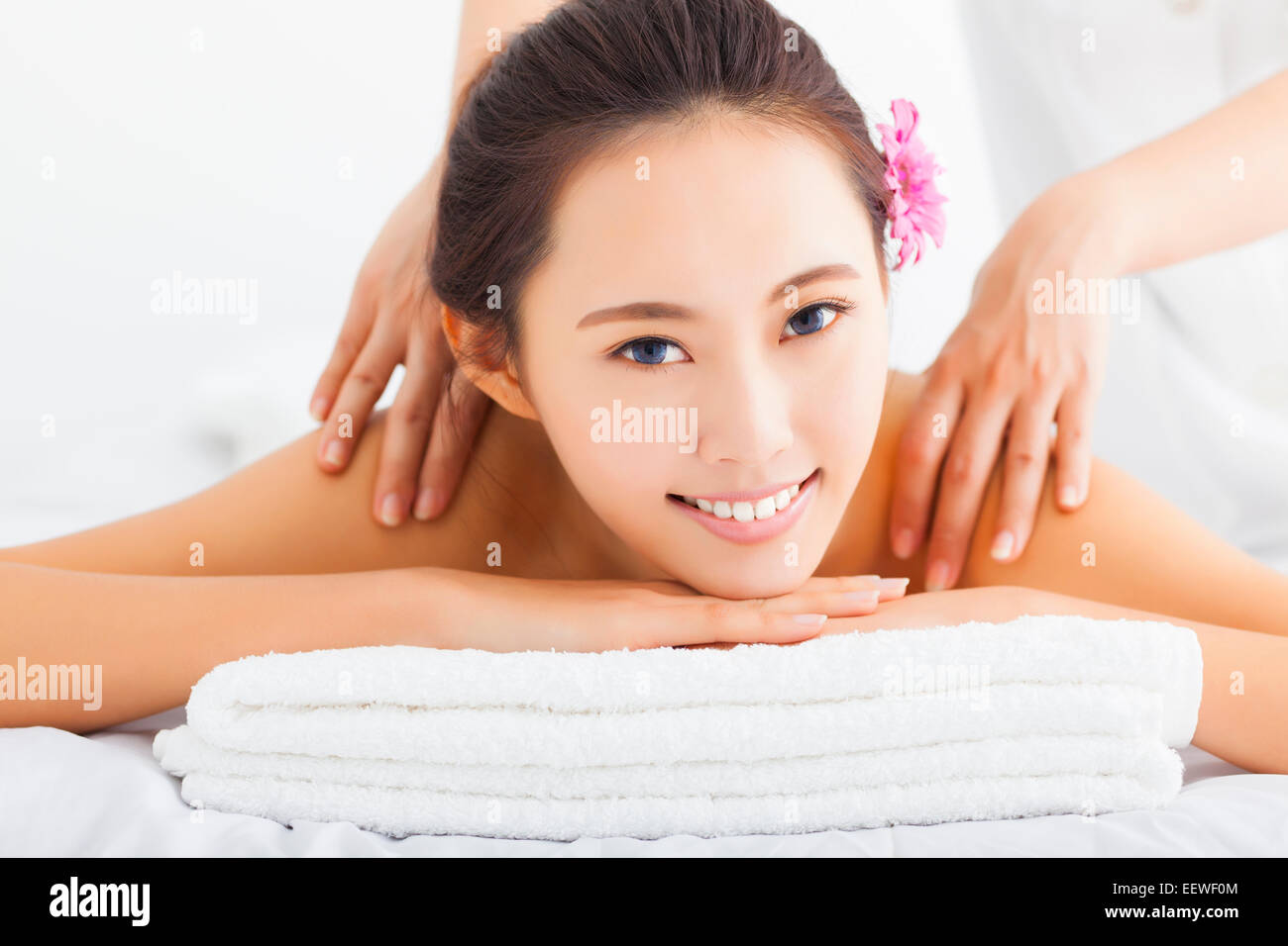 Girl Getting A Message young woman in spa salon getting massage Stock Photo - Alamy