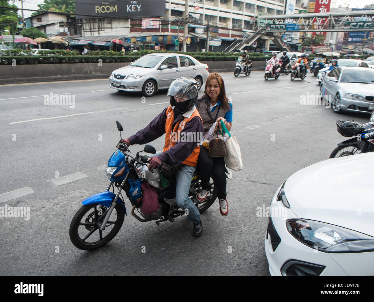 Near Lumphini Park.Scooter.Traffic,Cars,scooter taxi.Bangkok,Thailand