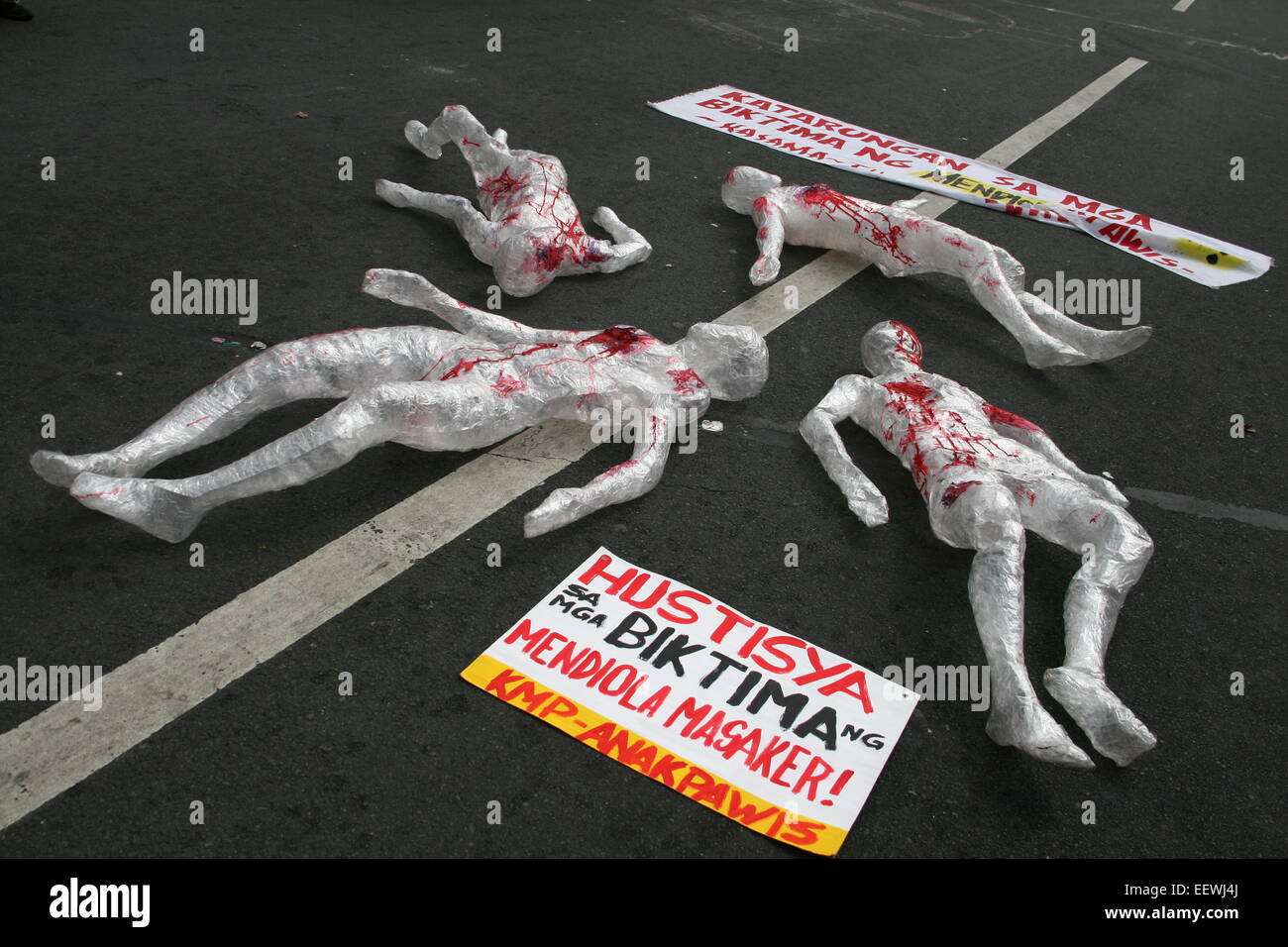 Human shaped statues made from plastic lie in the middle of Mendiola Bridge in Manila. (Photo by J Gerard Seguia / Pacific Press) Stock Photo