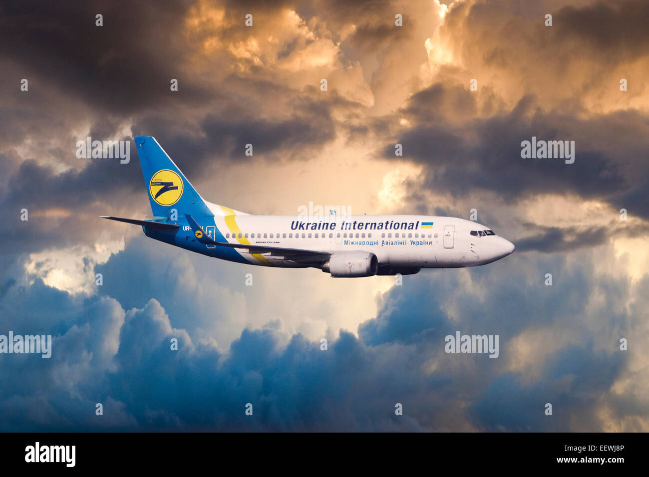 Ukraine International Airlines, Boeing 737-500 in flight in the evening Stock Photo