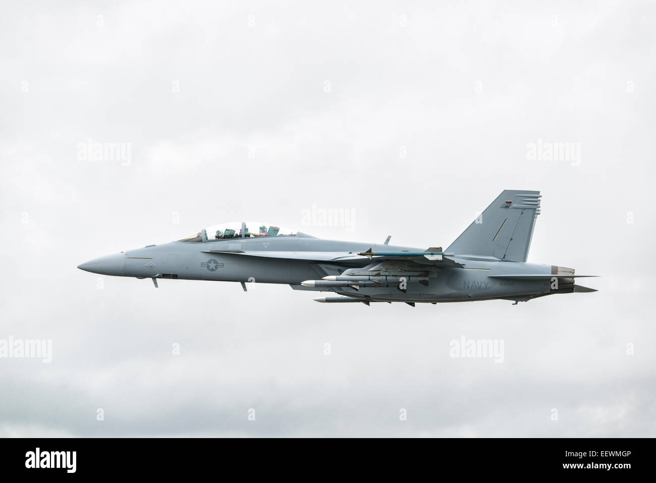 Boeing F/A-18F Super Hornet multi role fighter jet displays at the Royal International Air Tattoo fully loaded with ordnance Stock Photo