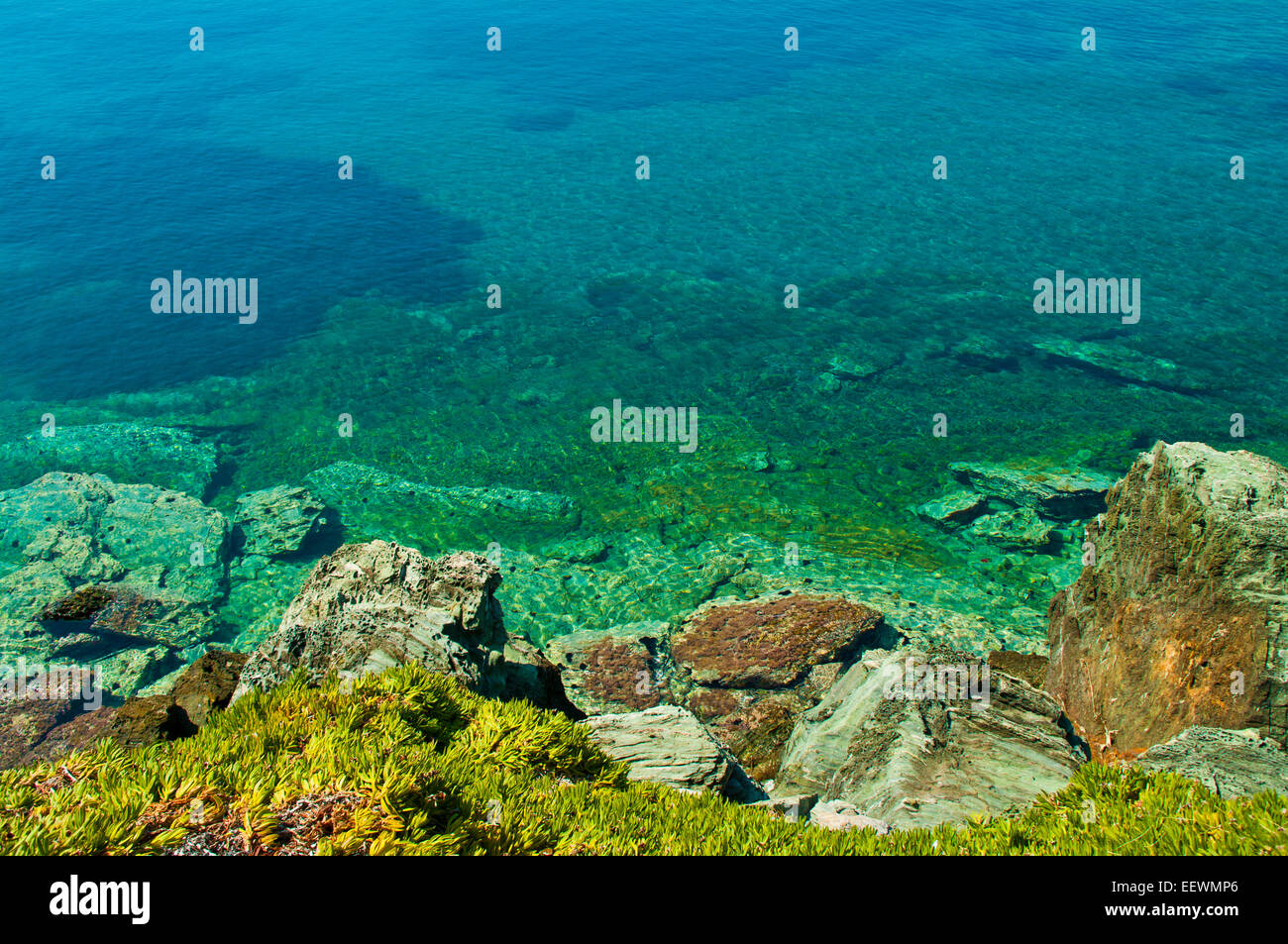 beach; beautiful; beauty; blue; cliff; coast; europe; grass; green; high; holiday; landscape; landscapes; mediterranean; nature Stock Photo