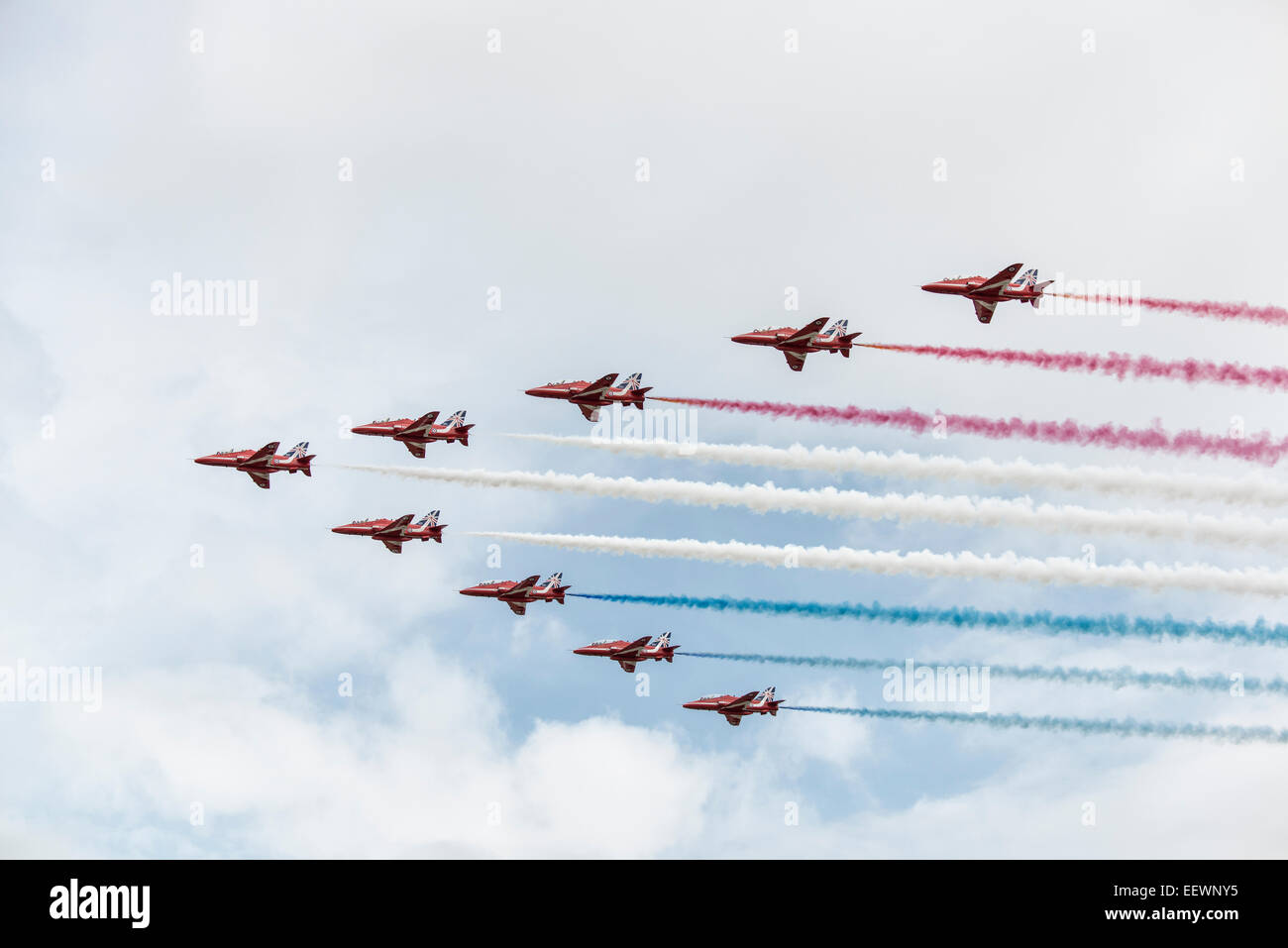 The British Royal Air Force Red Arrows Military Aerobatic Display Team in Big Battle Formation make their entrance at the RIAT Stock Photo