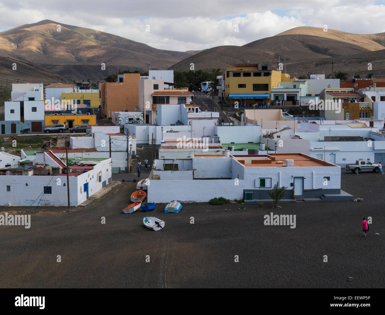 View to small fishing village of Ajuy on west coast Fuerteventura Canary Islands with colourful low rise houses Stock Photo