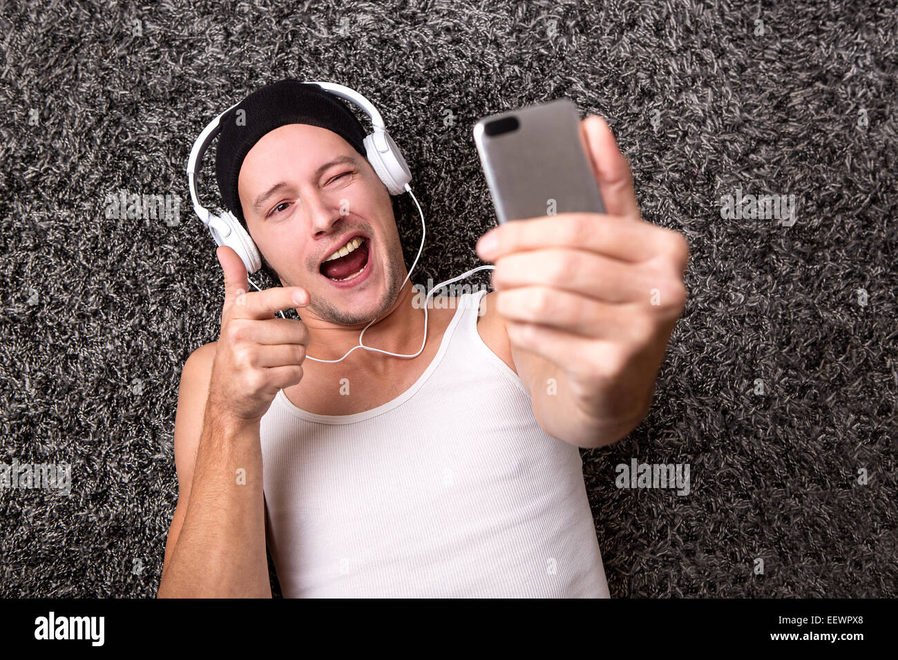 Young man happy smile attractive hi-res stock photography and images ...