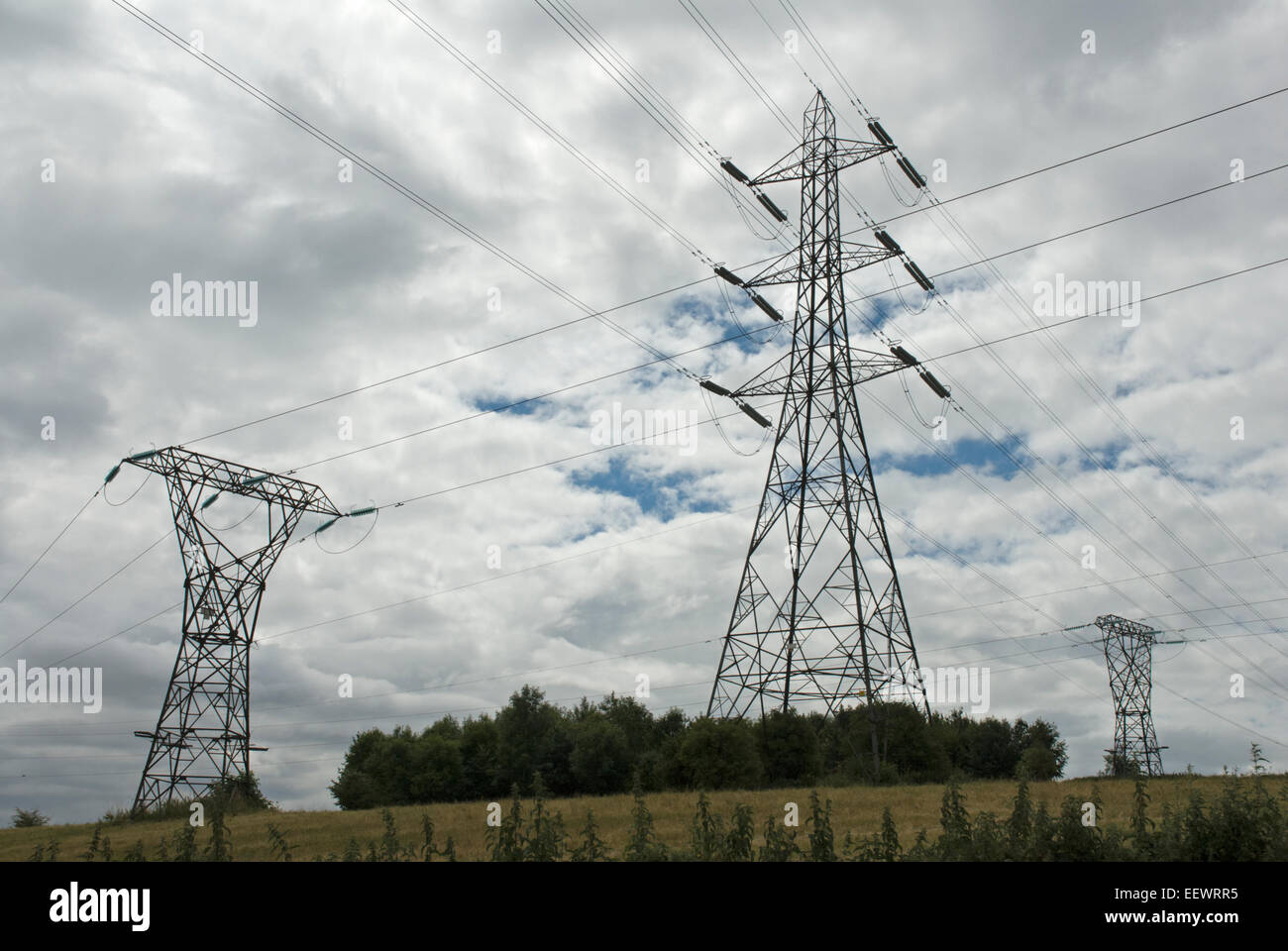 Pylons and electricity power line in English countryside Stock Photo