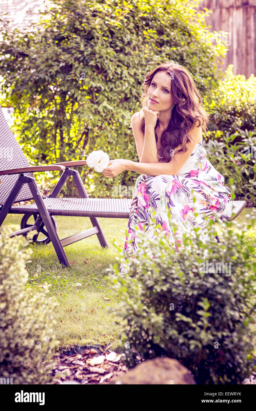 portrait of a young woman in the garden Stock Photo - Alamy