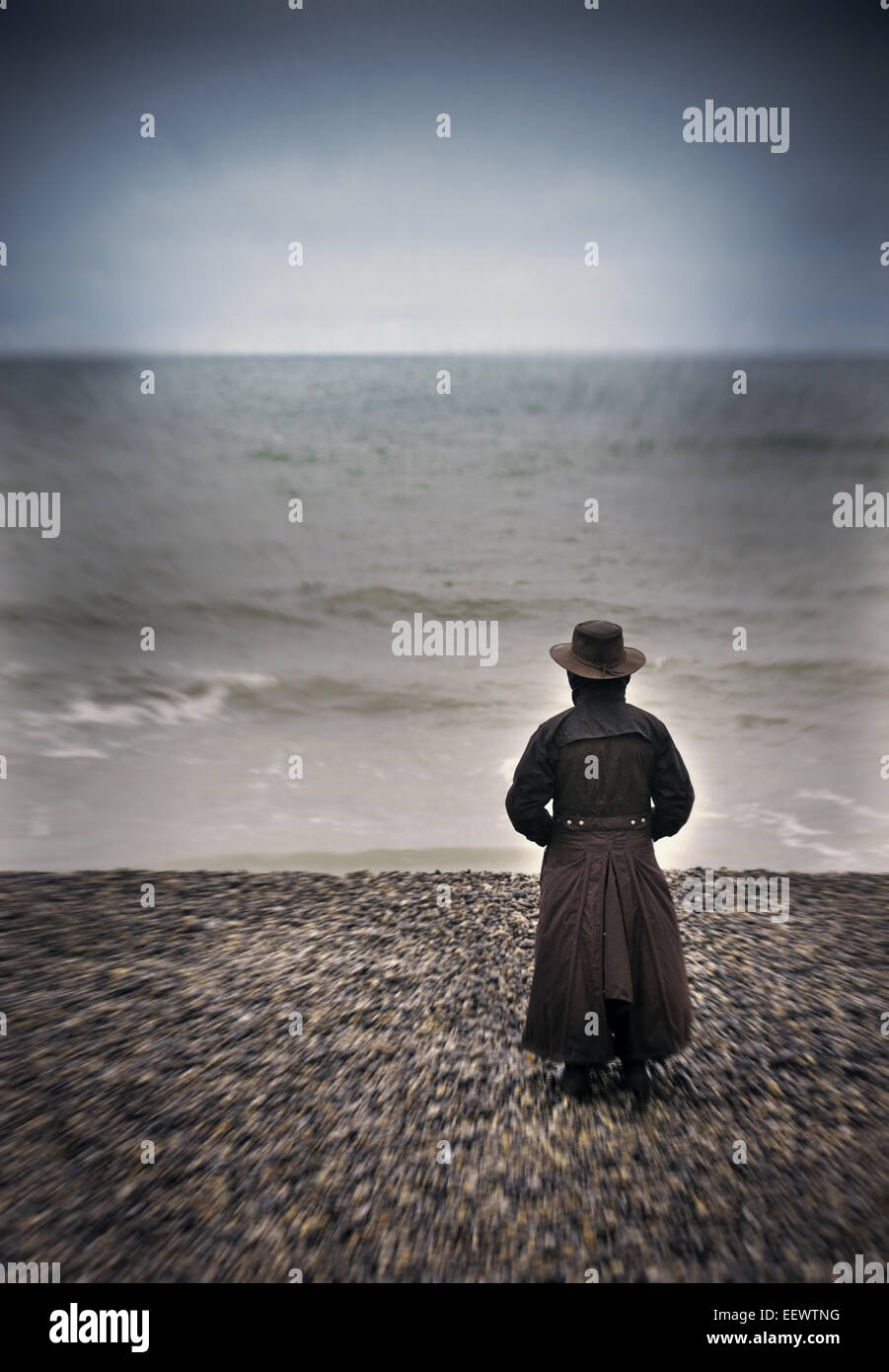Woman standing watching sea hi-res stock photography and images - Alamy